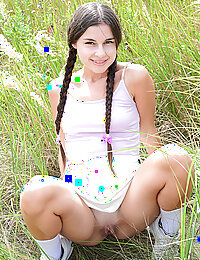Lovely teen with cute braids blows soap bubbles and shows off her nice tits and sweet pussy